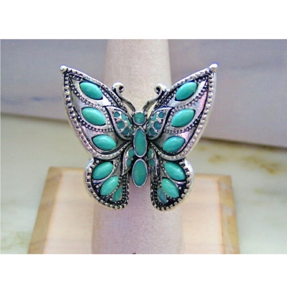 Butterfly adjustable turquoise and silver ring. Costume jewelry